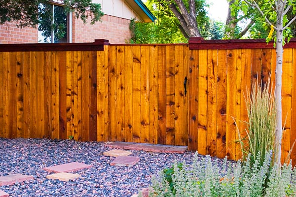 boulder fence staining and protecting
